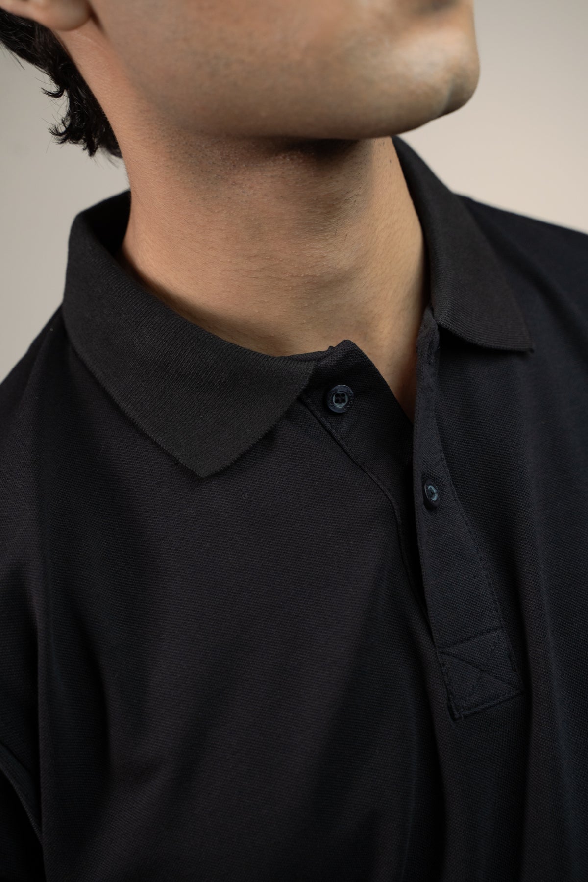Buttonaire Polo | Laurel Stretch – Obsidian Black